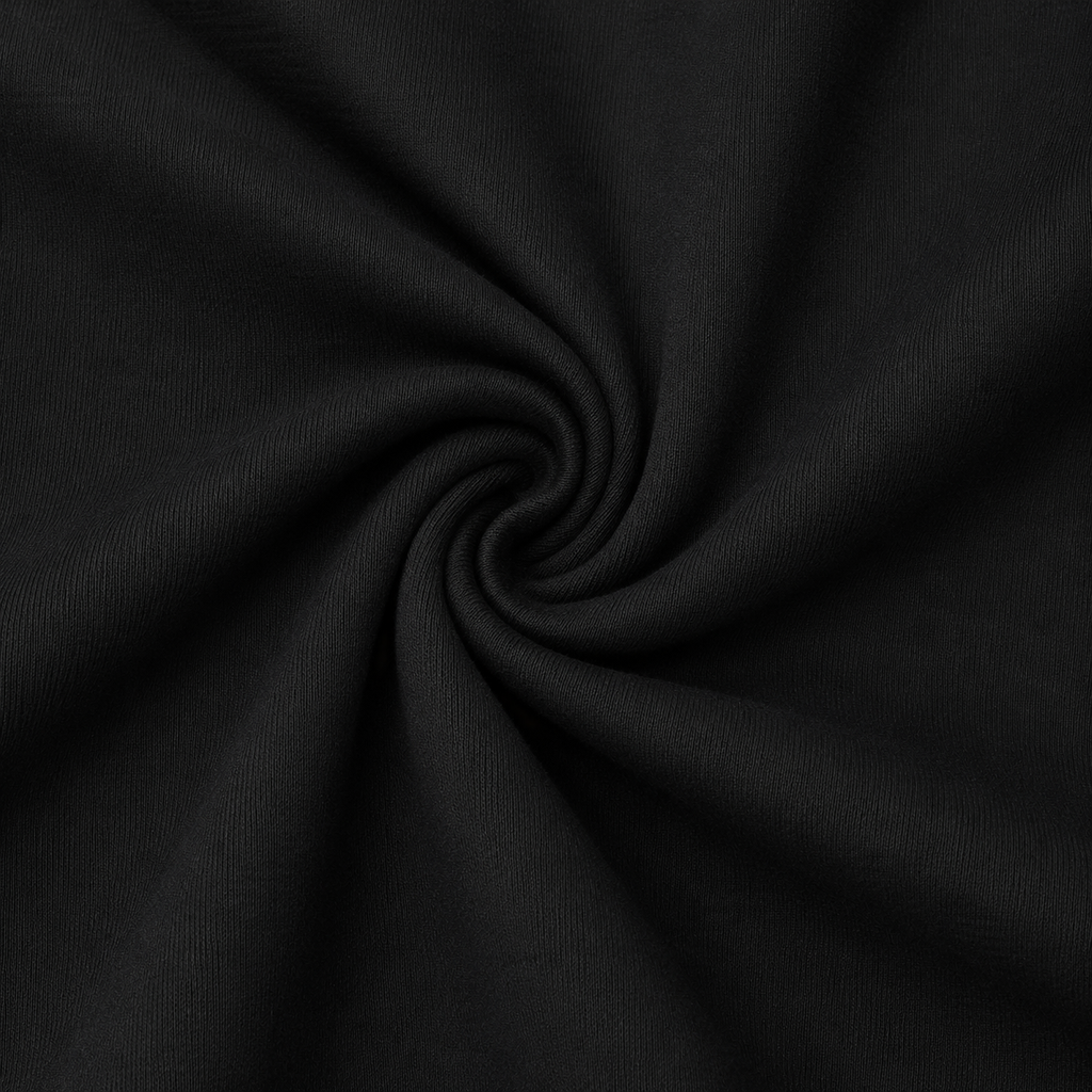 Close-up of the black fabric texture used in the Fitfigura Studio Bra – Soft Flow.