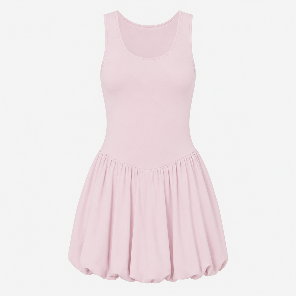 Flat lay of the Fitfigura Studio Dress – Soft Flow Form in light pink, showing the sleeveless neckline, fitted waist, and pleated skirt detail.