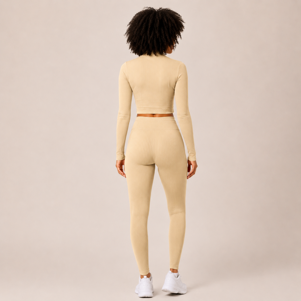 Back view of the Fitfigura Studio Set – Soft Flow Form in cream, showing the rear fit of the long sleeve top and leggings.