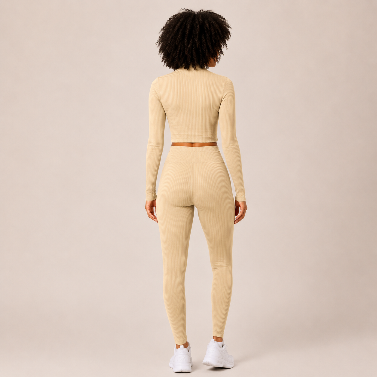 Back view of the Fitfigura Studio Set – Soft Flow Form in cream, showing the rear fit of the long sleeve top and leggings.