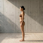 Side profile of the Fitfigura Support Bikini – Performance Form in brown, highlighting the streamlined side silhouette and swimwear fit.