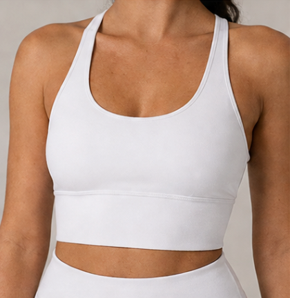 Close-up of the Fitfigura Sway Bra Tank Set in white, showing the scoop neckline, wide straps, and supportive bra tank fit.