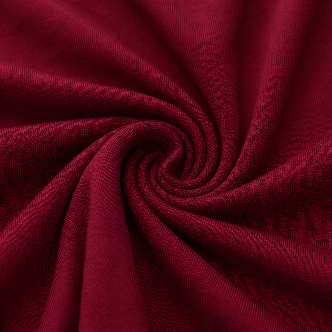Close-up of the burgundy fabric texture used in the Fitfigura Women’s Booty Boost Yoga Flare Pant.