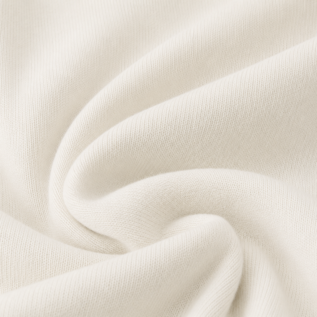 Close-up detail of the soft white fabric texture used in the Zip Hoodie – Utility Form.